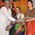 Charmy Kaur Instagram - Also thanks to Mangala Gowri garu to write a book on our film #jyotilakshmi n our support towards women empowerment #throwback #memories #5yearsofjyotilakshmi @purijagannadh @puriconnects #PCfilm ❣️