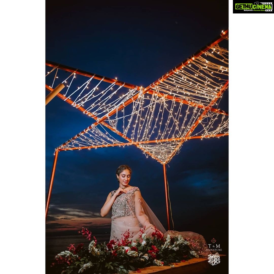 Deepti Sati Instagram - UNDER THE SHINING ⭐ E D E N L O V E : T H E F I N A L E D I T Six-yards-of-sheer-elegance bringing forth the nuances of festivity in bridal #couture. A design like no other, the ensemble features a lustrous net saree paired up with an ornate blouse & a one of a kind sequin-embellished underskirt. Inspired from #Christmas hues, the off-shoulder blouse features intricate handwork of T&M Signature's iconic floral motifs. The design is also mirrored in the #saree with botanical motifs scattered across the stunning fabric. Diverging from traditional concepts, the garment is elevated with a beautiful underskirt featuring intricate #sequin detailing that peeks through the sheer silhouette of the drape. Imbuing subtle elements of the sea, #scallop trims run across the handcrafted borders. The little gowns reflect a medley of #Christmas hues. #Reds and greens, with glitter and stones make up these little attires. While the pine green gowns feature long mesh bell sleeves that add movement, the red attires are accentuated with flowy mesh layers skirts. 'Star' shaped stones, sequins and cut beads adds a jolly sparkle! . . Gorgeous Outfit: @t.and.msignature Kiddie Models: Ummukulsu & Umminithanka @sandrathomasofficial Jewellery: @m.o.dsignature Photography: @tuesdaylights Decor: @podmevents MUA: @jeenastudio Styling: @soorajskofficial & @t.and.msignature Location: @indriyasandsresort