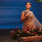 Deepti Sati Instagram - UNDER THE SHINING ⭐ E D E N L O V E : T H E F I N A L E D I T Six-yards-of-sheer-elegance bringing forth the nuances of festivity in bridal #couture. A design like no other, the ensemble features a lustrous net saree paired up with an ornate blouse & a one of a kind sequin-embellished underskirt. Inspired from #Christmas hues, the off-shoulder blouse features intricate handwork of T&M Signature's iconic floral motifs. The design is also mirrored in the #saree with botanical motifs scattered across the stunning fabric. Diverging from traditional concepts, the garment is elevated with a beautiful underskirt featuring intricate #sequin detailing that peeks through the sheer silhouette of the drape. Imbuing subtle elements of the sea, #scallop trims run across the handcrafted borders. The little gowns reflect a medley of #Christmas hues. #Reds and greens, with glitter and stones make up these little attires. While the pine green gowns feature long mesh bell sleeves that add movement, the red attires are accentuated with flowy mesh layers skirts. 'Star' shaped stones, sequins and cut beads adds a jolly sparkle! . . Gorgeous Outfit: @t.and.msignature Kiddie Models: Ummukulsu & Umminithanka @sandrathomasofficial Jewellery: @m.o.dsignature Photography: @tuesdaylights Decor: @podmevents MUA: @jeenastudio Styling: @soorajskofficial & @t.and.msignature Location: @indriyasandsresort