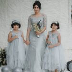 Deepti Sati Instagram - With these two angels 🥰 🤍Eden love 💙 Imbuing the beauty of the sea & the sky, #bridal collection traverses the concepts of feminity, faith & divine grace. Ushering the semblance of the blue #sea in couture, semi-precious #aquamarine stones bejewel this magnificent #MermaidCut gown. Hand-sewn embellishments add a soothing sparkle to the attire in semblance of waves sparkling in the sunlight The beautiful kiddie gowns are crafted in resemble of the bridal ensemble. In the spirit of #Christmas, the little ones are portrayed as #angels, with their white #wings & #wands bearing the glad tidings of the matrimony for the #bride. #EdenLove 💙 . . . Jewellery: @m.o.dsignature Photography: @tuesdaylights Decor: @podmevents MUA: @jeenastudio Styling: @soorajskofficial & @t.and.msignature Location: @indriyasandsresort Gorgeous Outfit: @t.and.msignature