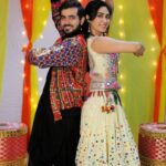 Deepti Sati Instagram - This Navratri reel and twist Kamariya with us @99neerav_ ✌️😁 Videography : @kalartistfilms Choreography team : @menonshruthi_b @amitjadhav281 Outfit : @harshalds