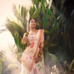 Deepti Sati Instagram - Blooming white 🌼🤍 . . . 📸:@arunmathewphotography Photography asst : @annjosalins @abin_km_ Stylists : @joe_elize_joy Makeup : @ashna_aash_ Outfit : @turmerikofficial Jewellery : @rishirichjewels Styling assisted : @sanliya_sabu Location : @niraamayasamroha
