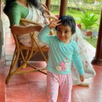 Divya Padmini Instagram - My baby💙💚 📸:@ratheesh_balakrishnan_poduval #momndaughtertime #momlife #mom #baby #candid #pic #cat #catstagram #cgh #coconutlagoon# Coconut Lagoon, CGH Earth