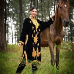 Eshanya Maheshwari Instagram - She was beautifully out of place. Sometimes I believe she intended to be. Like the moon during the day. Wearing this beautiful hand embroidered Kashmiri pheran by @pashmkaar 🖤✨ M&H by @zuberiya_ansari Photography by @ajayyparmar #kashmirilook #kashmir #pheran #pashmkaar #kashmiripheran #esshanyamaheshwari #esshanya