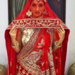 Gurleen Chopra Instagram - Comment if you want to see me without Ghunghat (veil) 🌹 Outfit by @rajkumarifashions Styled by @richahaware Chandigarh, India