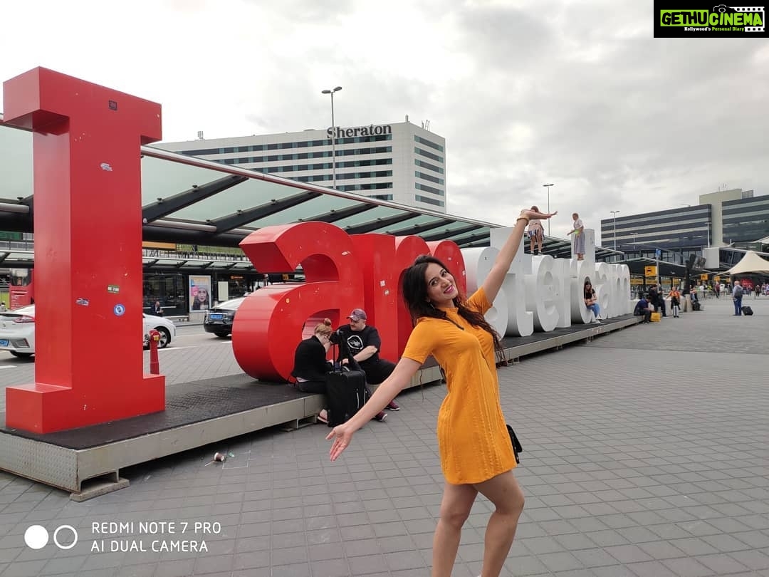 Harshika Poonacha Instagram - My signature pose at the last stop of my beautiful holiday ❤❤❤ @iamsterdam it is 🥰❤ #amsterdam Amsterdam, Netherlands