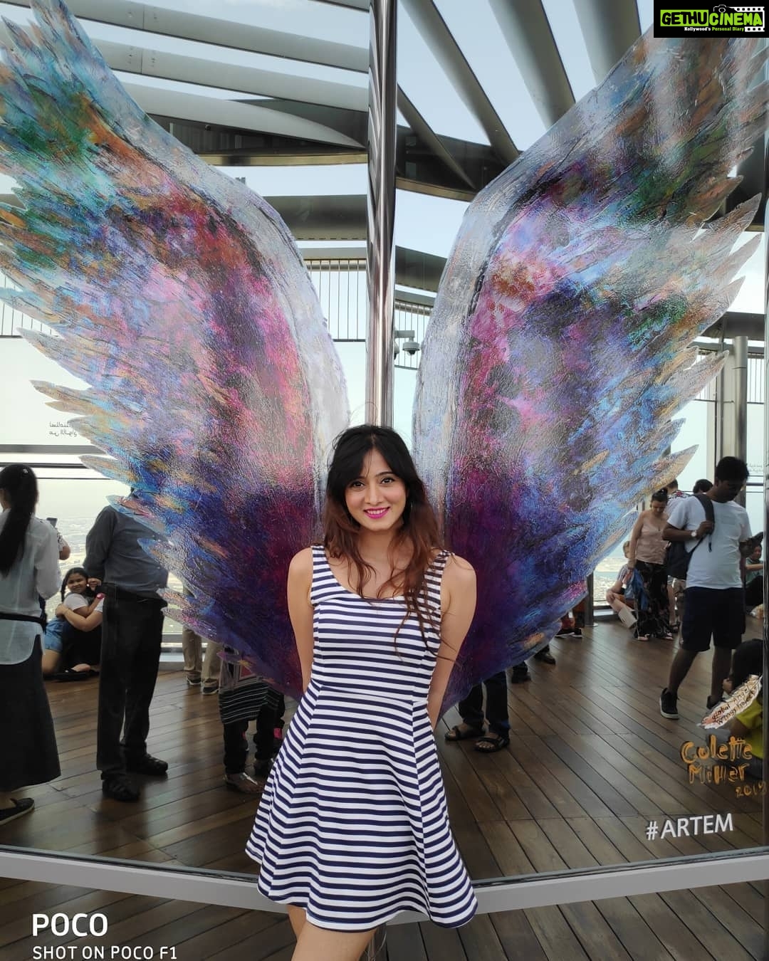 Harshika Poonacha Instagram - Flying #atthetop #burjkhalifa 💗💗💗 My winggame at the world's tallest building 🥰 I told you I can fly 🙈 @burjkhalifa @dubai Photo credit : @anto.abra Dubai, United Arab Emirates