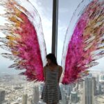 Harshika Poonacha Instagram - Flying #atthetop #burjkhalifa 💗💗💗 My winggame at the world's tallest building 🥰 I told you I can fly 🙈 @burjkhalifa @dubai Photo credit : @anto.abra Dubai, United Arab Emirates
