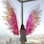 Harshika Poonacha Instagram - Flying #atthetop #burjkhalifa 💗💗💗 My winggame at the world's tallest building 🥰 I told you I can fly 🙈 @burjkhalifa @dubai Photo credit : @anto.abra Dubai, United Arab Emirates