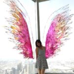 Harshika Poonacha Instagram - Flying #atthetop #burjkhalifa 💗💗💗 My winggame at the world's tallest building 🥰 I told you I can fly 🙈 @burjkhalifa @dubai Photo credit : @anto.abra Dubai, United Arab Emirates