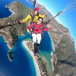 Harshika Poonacha Instagram - Sandalwood “Chitte” 🦋 and Mollywood “Neela Shalabham” 🦋 flying for real 🪂 How filmy 🙈🙈🙈 . . . My first Paragliding experience was as beautiful as these names 🪂 The feeling of being above the earth is surreal ♥️♥️♥️ I literally felt I had wings and I was flying 🦋🦋🦋 Thankyou @airborneparaglidingtr for this wonderful and thrilling experience 🤗 My pilot #tuna , my guide @atamantra and the driver 👍👍👍 You guys were amazing 🪂🪂🪂 I chose the most beautiful place on earth to sail myself in the sky and that is #turkey , Ahhhhh! The view from the top is ecstatic and so overwhelming,I was up there for more than 45 minutes and It’s something unreal and unimaginative what happens up there . Swipe right and if you see the last pic , you can actually feel like I’m above the globe 🌎 This was my #bucketlist No 25 I guess, And I did it ♥️ You all should do it too ! It’s ONE LIFE , so LIVE IT 💕 Fethiye Paragliding, Turkey