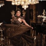 Harshika Poonacha Instagram - Ufff ♥️ Why do I love to swirl somuch 🥰 Gold and Glitter princess in a @nadira_couture creation 🌟✨ At the @the.nailartistry launch ♥️ Thankyou @_yellowz_media_ @deninmd @imozio_wedding_planner for the lovely pics 😍