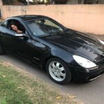 Ishika Singh Instagram - Black beauty #mercedesslk #mercedes