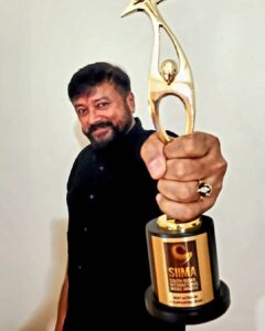 Jayaram Instagram - As a father it's my proudest moment to receive my son's award.. thank you @siimawards 

@kalidas_jayaram