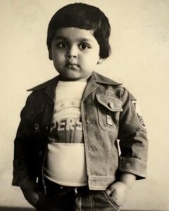 Karthi Instagram - My most favorite dress in childhood 😍. Denim jacket and pants. I used to wear it every time Rajini Sir’s “My name is Billa” song came on tv. #oliyumoliyum