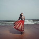 Karthika Nair Instagram – An elegant affair with the Ocean 🖤 

#throwback #waves #beach #brownskingirls