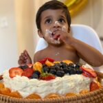 Lakshmy Ramakrishnan Instagram - Made a fruit cake for Ved, with his favorite fruits , it was truly amazing to see him attack it😆😆