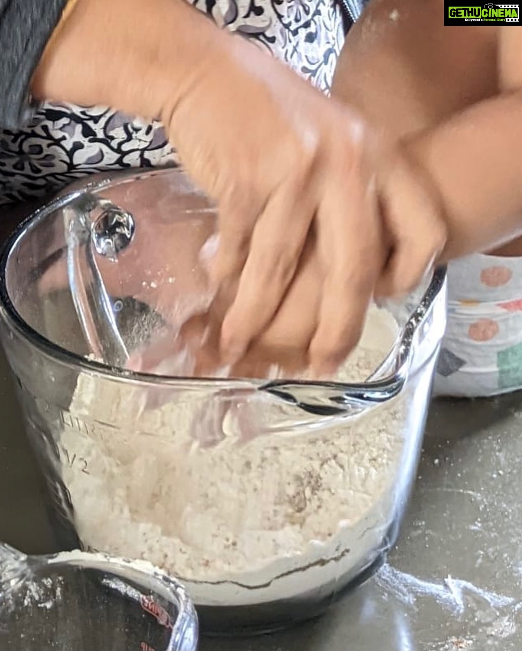 Lakshmy Ramakrishnan Instagram - Home baked rusks, but the fun part is the digging into the flour with Ved❤️
