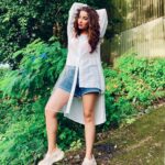 Madhuurima Instagram - The woods are never solitary--they are full of whispering, beckoning, friendly life. ... having my comfort in @vandysway_world shirt. Enjoying every bit of the greens ❤️ #fashion #love #gratitude #style #awesome #babe #divyadrishti #nyrabanerjee #actor #photoshoot #beauty #blessed #success #picoftheday #white #serene #angel #shirt #stripe #only #sketchers