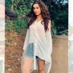 Madhuurima Instagram - The woods are never solitary--they are full of whispering, beckoning, friendly life. ... having my comfort in @vandysway_world shirt. Enjoying every bit of the greens ❤️ #fashion #love #gratitude #style #awesome #babe #divyadrishti #nyrabanerjee #actor #photoshoot #beauty #blessed #success #picoftheday #white #serene #angel #shirt #stripe #only #sketchers