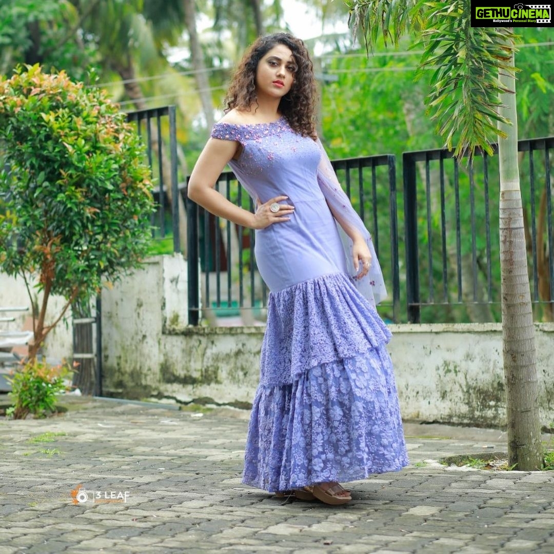 Miya George Instagram - Wearing one of my favourite colours 💜 Thanks @jeunemaree for this beautiful gown Pic courtesy: @umeshpnair