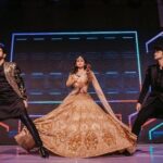 Mouni Roy Instagram - Happy tired feets at the sangeet🤩🧿• • • • Wedding planners : @neferrtitiweddings Decor & styling : @neferrtitiweddings Hospitality partner : @hiltongoaresort Filmography: @theweddingjournalsofindia Photography team : @priyamparikhpictures Hospitality management: @Bgc.event Technical partner : @resonateproblr DJ: @dj_sharath Unforgettable memories created by @reemasang @studioneelabh After party @thehimanisingh @databass_music