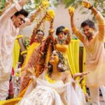 Mouni Roy Instagram - Happyyyyyy haldi facesss 🌼🌼🌼🌼🌼🌼🌼🌼🌼🌼🌼🌼🌼🌼🌼 • • • • Outfit my @anusoru Decor & styling : @neferrtitiweddings Hospitality partner : @hiltongoaresort Filmmaking : @theweddingjournalsofindia Photography team : @priyamparikhpictures Hospitality management: @Bgc.event DJ: @dj_sharath Mehendi artist : @halimakhannizami