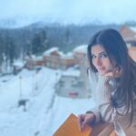Mouni Roy Instagram - ❄️ The rooms were very still, while the pages were softly turned and the winter sunshine crept in to touch the bright heads & happy faces with white greetings. ❄️