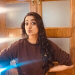Namitha Pramod Instagram - VANITY VAN SCENES ! That weirdo doing a pose☠️ Hairdo for a salwar becomes the one strange style for my sweatshirt 🥲 That typical pout ,showering utmost cuteness(faking)before the shoot begins 😝