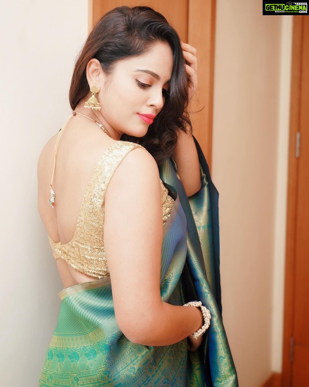 Nandita Swetha Instagram - Happy Tamil New year to All of you ❤️ . Clicked by @artistrybuzz_ . Saree from @elite_by_elsa Accessories from @ . Bracelet- @jewelitebylueamalin . #tamilnewyear #saree #love #collaboration #sleevelesblouse #goldenblouse #pinklips #indoor #click #photography #photo #nanditaswetha #tfi #south