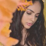 Nandita Swetha Instagram - ‘Definitely not trying to find the prince’ . . . Shot on @samsungmobile #s20ultra Makeup @nanditaswethaa Clicked by @nanditaswethaa Edited in @picsart Outfit - Not to be mentioned . . . #quarantineshoot #lifeasphotographer #selfshoot #selfclick #indoor #home #poser #tone #yellow #flower #hibiscus #hibiscusflower #orange #yellow #messyhair #croptop #makeupon #beauty #bangalore #actress #south