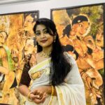 Navya Nair Instagram - Thank u so much @sreerani_online fr this beautiful@painting and hand painted mural saree .. Accessories @chinkaari_collections *The Saree* The painiting is of Padmapani Bodhisattwa from the paintings of Ajanta caves. A good amount of exploration was done to get the authentic paintings. The human components and most of the other components in the painting except for the ornaments were painted using faded out approach. This was to bring out the grandeur of the ornaments and still give the painting an antique look. Painted using fabric acrylic paints. The size is 26″X40″. The painting is done on Special handwoven Balaramapuram Sreerani saree series. The yarn used is 100% best quality Unakku Pavu cotton yarn. This is further enriched with 3 inches bold Golden colour Kasavu on the Mundani/Pallu. Priced at Rs. 20,400. *The Wall Painting* The painting is from the Ajantha caves and is of Prince Siddharth having a worldly life with lot of people posted to attend to him and serve him so that he doesn't come across the realities of life like hunger, old age etc. The Artist has endeavoured and has accomplished to the bring the antique and worn out look in the painting by employing the Wash & sponging techniques using the water colour method. Professional quality Winsor & Newton's Acrylic medium to ensure long lasting colour quality. The painting is done in 3 pieces of canvas 2 measuring 25" X 50" each which goes on both the sides of a 50"X50" middle piece. Priced at Rs. 1,44,000.