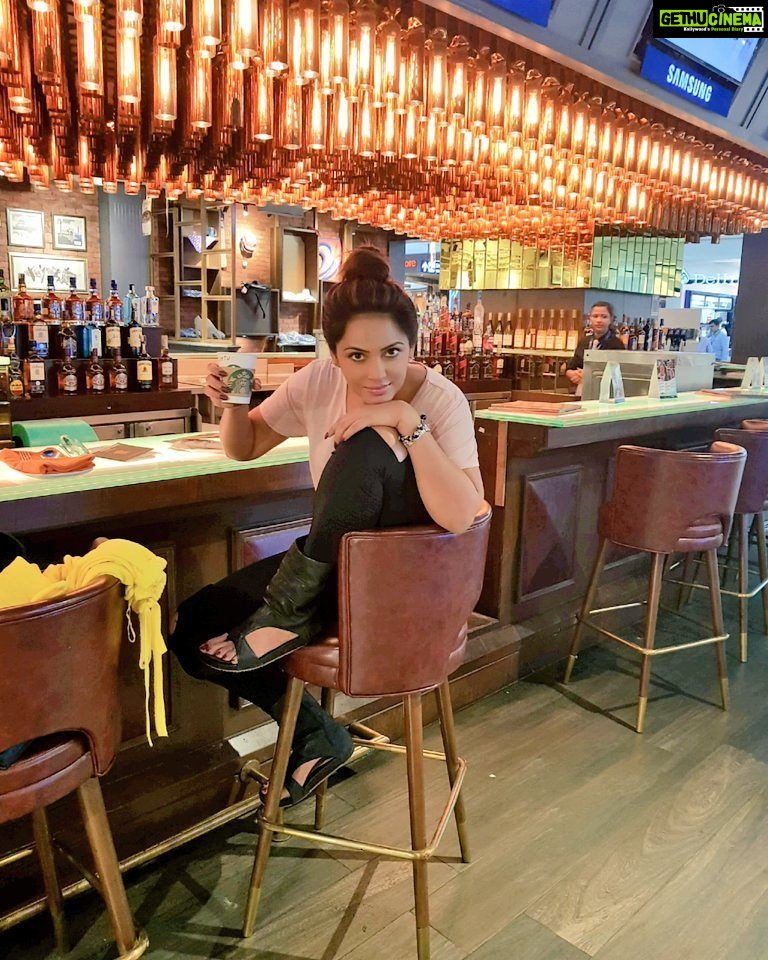 Neetu Chandra Instagram - Comfort zone #Sportsbar #blackcoffee off to #Kyrgyzstan 4m #Delhi #Airport I am high on life,don't need 2 drink !! Nothing distracts Me 😊😁😘❤