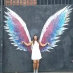 Neetu Chandra Instagram – Happy to have stumbled upon this visual treat!❣️ This amazing graffiti scattered across the town leaves me amazed! 🎨 
Wish we had wings so that we could soar through the skies! 👼💫
#art #graffiti #angelwings
