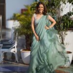 Nisha Agarwal Instagram – I wore this beautiful ruffled saree by @ridhimehraofficial to my sister @kajalaggarwalofficial #godhbharai. This stunning color and silhouette truly had my heart. 

Wearing @ridhimehraofficial 
Jewellery @vinayagg2060 (my most fav Jewellery designer) 
Shoes @stevemaddenindia 
MUAH @khush.mua 
📸 @craftingemotions 

#indianweddingoutfits #indianwear #saree #predrapedsaree #rufflesaree #indiandesigners