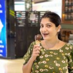 Papri Ghosh Instagram - The #kid inside me appears while eating #chocolate #icecream I can’t #recognize #myself #chocolatelovers #icecreamlover #childhoodmemories #childish #childhood #paprighosh #nomakeup #green #floral #tshirt #dayout #datewithmyself #pandavarillam #kayal #suntv @suntv