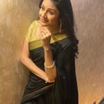 Paridhi Sharma Instagram - The world always looks brighter from behind a smile. #instapic #ckmdklook #starplus #sari #black #paridhisharma