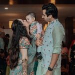 Pooja Bose Instagram – Few pics from my mehendi, when the only time I was twinning with my baby and a big thank you to @the_adhya_designer for making it possible. Loved the color and the floral print u chose for us. We 3 are wearing @the_adhya_designer
Hair by @hairbymousami
Pic credit @sumit.productions