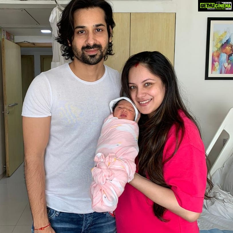 Pooja Bose Instagram - This was our 1st family pic and we both (mumma papa) r extremely tired sleepless exhausted and been thru a roller coaster of emotions in the last 72 hours but...... it was all worth it . And since then till now I can't believe that I am blessed by you my baby ❤ God been so kind and this miracle happened. U r my life and with passing day I see u growing up and imagine how life will be when u wont need me around but I guess I will still keep staring at u for hours when u asleep and sometime shed a tear of joy . I just love u and still can't believe I am so lucky to have u in my life .