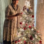 Poornima Bhagyaraj Instagram – Merry Christmas to all . Posing in front of the tree , painstakingly assembled by @kikivijay11 and team and outfit by @poornimas_store