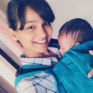 Poornitha Instagram - Okay guys, those who follow my instastories know that the sweetest people @soulslings sent over a cutest package of their soulsling for me to try out with little baby Navya :) My husband (read: the most amazing baby daddy) and I have some travels coming up and I was originally going to whip out the soulsling carrier out to help us out then but all of you know how impatient I am, we decided to use it for our travel from our room to the kitchen which is a floor below 😂 
I was pleasantly surprised by how comfortable these slings are for both me and little baby N. Such comfortable soft fabric letting me snuggle my baby (it's like giving her a hug constantly.. now how cute is that!), good support which come with completely adjustable slings so that both me and my husband (who is twice as tall as me) can use it seamlessly 😂
Even though tiny little Navya is not big enough for these slings so that her legs can hang out of them, she was still totally comfortable all curled up inside it and it gives great support both for her head and her mommy's back! 
Such a great product, I can't wait to use it regularly and see little baby Navya grow in it :) Thanks again @soulslings for sending this over. Do check out their page, new mommas and do yourself a favor by treating yourself and your baby to one of these :) #soulslings
#soulslingsindia #babywearingwithsouls #CuddlePartyWithNavya #ConstantSnuggles#vsco #vscocam