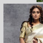 Prayaga Martin Instagram - Six Yards of Pure Grace!! In a world full of changing new trends, I'm pleased to find something still classy in this gorgeous Kancheepuram saree classed up with a combination of metallic gold and splashes of white woven with trendy linear pattern all over the body. Beautifully Crafted for me by @elanclassics #elandesignerstudios