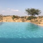 Rahul Bose Instagram - The mad infinity pool, the newest surprise after two decades of coming here. @manvardesertcampresort #coldwaterhotsun #thatshowyouduneit www.manvar.com @motisingh.rathore