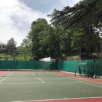 Rahul Bose Instagram - When a squash player tries to play tennis it's catastrophic. Ravi, the club tennis pro and tormentor-in-chief seen sinisterly in the distance. But what a setting. #tennisat6000ft #tearsonthecourt #watchedbypinetreesandmonkeys