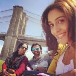Regina Cassandra Instagram - Shooting for #subramaniamforsale in #newyorkcity 🍎 shots between shots!😋 #brooklyn bridge backdrop. #nyc #thebigapple #itsabeautifulday @jetpanja Brooklyn Bridge Park & Carousel