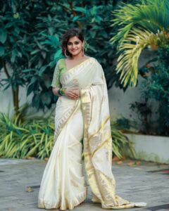 Remya Nambeesan Instagram - Happy Onam my friends 😍😍!! @divyaaunnikrishnan @jo_makeup_artist @pranavraaaj wearing @devraagh !! #onam !! STAY SAFE ❤️