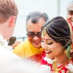 Richa Gangopadhyay Instagram – Remembering our beautiful, waterfront Indian ceremony that took place on this day, last year, and how special it was for our families to come together as Joe and I completed our Hindu Bengali rituals together (Joe is a master at reciting mantras, nbd). We were lucky to have been able to honor both our cultures and traditions and to have Joe’s family embrace, and enthusiastically participate in every nuanced element of our celebrations with open arms. ⁣⁣
⁣⁣
From the “gaye holud” (haldi/turmeric ceremony), to the “ayeburobhaat” (bride-to-be’s final luncheon with her favorite dishes), “totto” (or tatwa, groom welcomes the bride to their family) and “bor boron” (bride’s mother and female friends welcome the groom), each distinctive event bonded us closer, for life.🔒♾️⁣⁣
⁣⁣
I can’t even put into words how utterly grateful I am, and always will be, to my parents for giving their only daughter a wedding that dreams are made of. To have our extended family and friends from all over celebrate our union over the three-day wedding events was indescribable, and on our anniversary, revisiting over 3000 photos brings us back to the fun, laughter, tears of joy (and yes, of course a little bit of chaos…it’s a fusion wedding!). 🥳⁣⁣
⁣⁣
We are blessed beyond words, for having each other and for having our families love and support us till the very end. We love you Ma, Baba, Deb and Steve!🥰⁣⁣
⁣
Venue: @roostertail
Makeup: @jhobby21 
Hair: @hairbyaysha 
📷: @kelliesaunders Detroit, Michigan