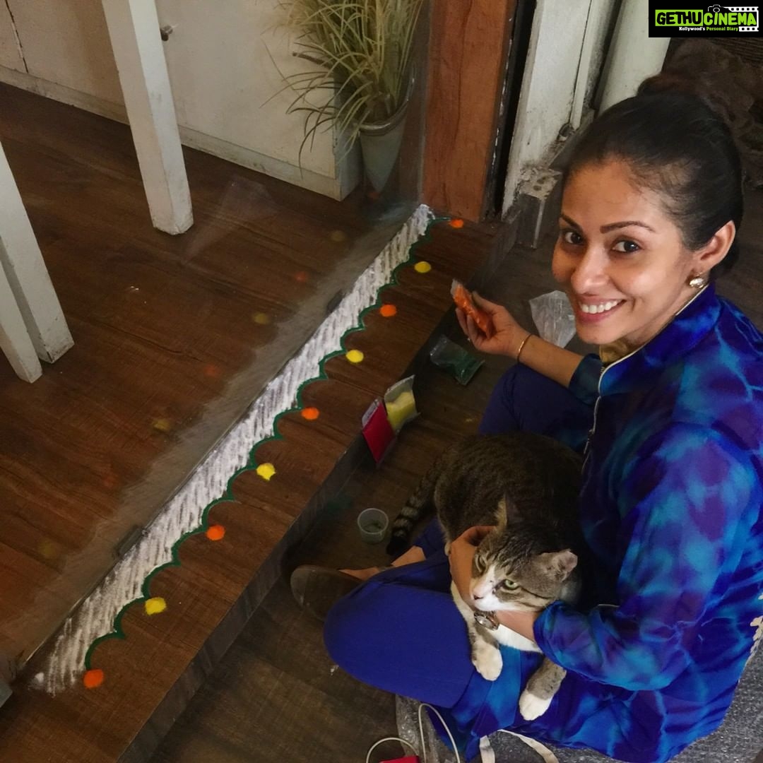 Sadha Instagram - When your work place becomes your home! Earthlings Cafe is where I spend my 12/13 hours everyday and even when I'm back home, this is what keeps me occupied.. Acting was always a passion but what Veganism is done to me, is something I would probably never be able to put in words. There are numerous challenges in this task I've taken upon myself but each day when I wake up the thought of those million babies being exploited for food gives me more than enough courage to battle anything that comes my way! That reminds me we've successfully completed our 6 months! π Also there are so many new things I find myself doing here for the first time in my life.. Just like this Rangoli, of course with the kind help extended by MoMo! The one who represents ALL THE EARTHLINGS out there! Happy Diwali everyone! #GoGreen #GoVegan #LiveAndLetLive #SayNoToCrackers