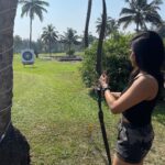 Sakshi Agarwal Instagram - Nothing clears the mind like an afternoon out shooting🏹🏹 . My first time ever! Learning a new skill😋 . #goa #archery #beginner #shoot #archerylifestyle #instapic #holidays #vibing The Leela Goa