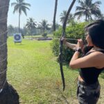 Sakshi Agarwal Instagram - Nothing clears the mind like an afternoon out shooting🏹🏹 . My first time ever! Learning a new skill😋 . #goa #archery #beginner #shoot #archerylifestyle #instapic #holidays #vibing The Leela Goa